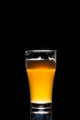 craft beer glass on black background