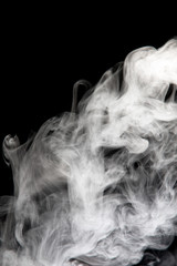 White smoke isolated on black background.