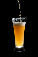 craft beer glass on black background