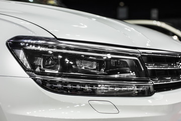 headlight of white modern car with led and xenon optics © Xristoforov