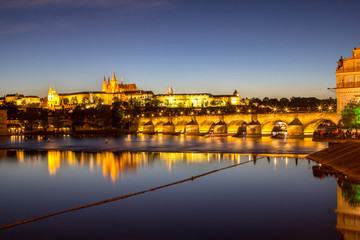 Prague castle and the Charles bridge at dusk