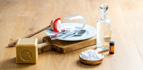 Fototapeta na wymiar green soap, essential oils and baking soda for DIY cleaning