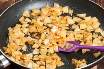 Caramelized Apples On Frying Pan. Cooking Process.