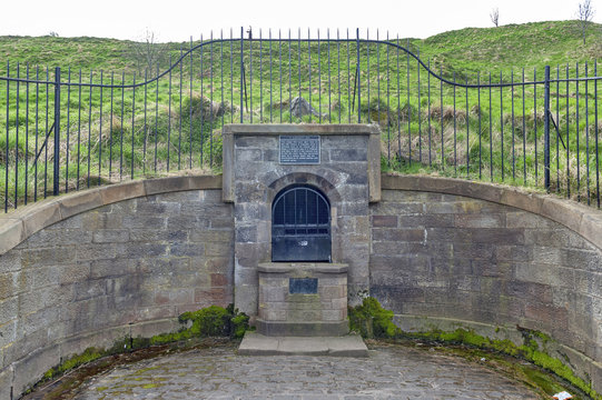 The remain of the ancient Well House located at the foothill of Holyrood Park in Edinburgh, Scotland, UK