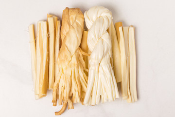 Healthy Snack. Smoked string cheese. Kobarcik. Selective focus
