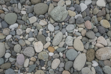 dry pebble on beach abstract pattern texture background