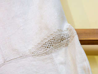 Fragment of an ancient authentic lace on the sleeve of a woman's lower shirt. Polissya. Belarus.