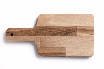 Wooden chopping board on a white background