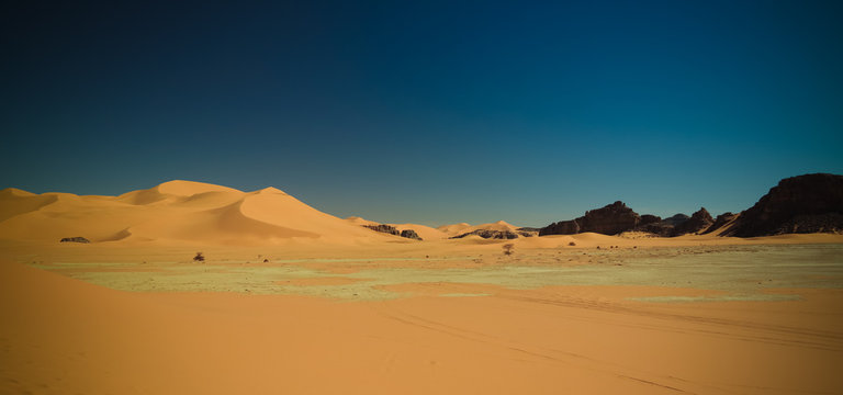 Landscape of sand dune and sandstone nature sculpture at Tamezguida in Tassili nAjjer national park, Algeria