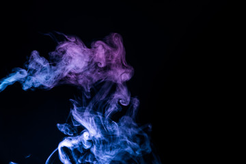 Blue smoke isolated on black background.