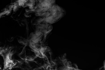 White smoke isolated on black background.