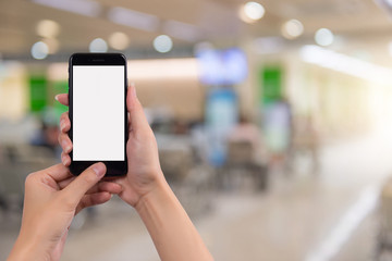 Cropped shot view of woman's hands holding smart phone
