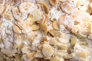 Almond croissant  filled with almond cream and topped with sliced almonds