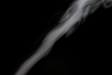 White smoke isolated on black background.