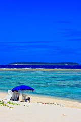 Parasol on Sandy Beach