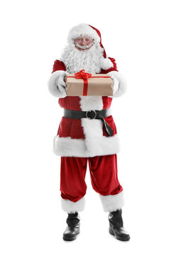 Authentic Santa Claus with gift box on white background
