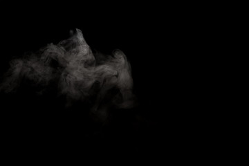 White smoke isolated on black background.