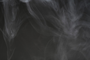 White smoke isolated on black background.
