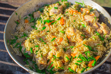 pilaf from chicken in cauldron