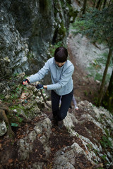 Naklejka na ściany i meble Hikers on a rough trail