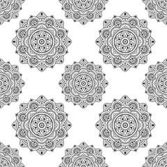 Circular pattern in form of mandala for Henna, Mehndi, tattoo, decoration. Seamless decorative ornament in ethnic oriental style. Coloring book page.
