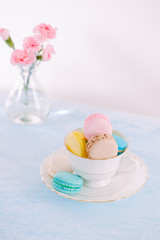 Delicious french dessert. Colorful pastel cake macaron or macaroon