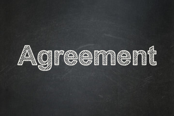 Business concept: text Agreement on Black chalkboard background