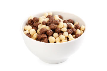 Cereal balls for breakfast in a bowl isolated on white background