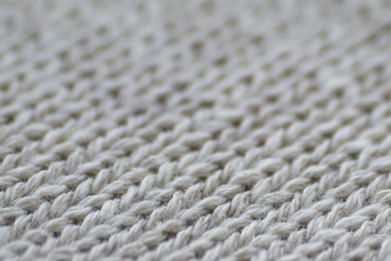Gray fabric clothing texture close up. Blur background