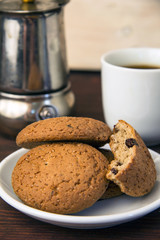 oatmeal cookies, coffee Cup and geyser coffee machine