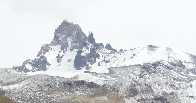 Campanario mountain in The Andes with snow on a windy winter gray day. Mendoza, Cuyo, Argentina.