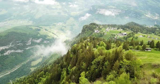 Aerial drone footage of cliffs and fields in Switzerland