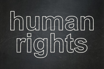 Obraz premium Political concept: text Human Rights on Black chalkboard background