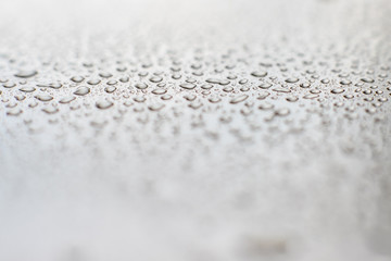 droplets of water on a white surface
