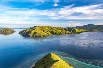 View From The Top of Gili Lawa Darat Island in the Evening with Blue Sky and Blue Sea. Komodo National Park, Labuan Bajo, Flores, Indonesia © Pnnchen