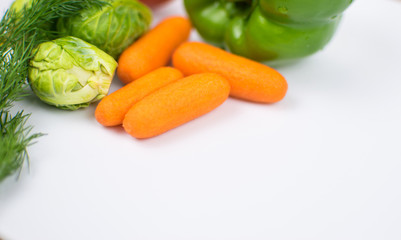Fresh vegetables on a white background.