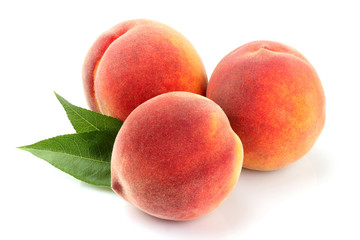 Peach fruits with leaf isolated.
