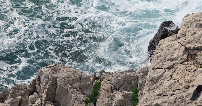 Sea Waves Behind The White Rocks