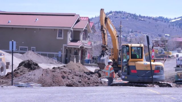 Road construction crew working in town
