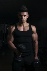 Bodybuilder with dumbbell