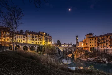 Photo sur Plexiglas Ponte Vecchio An evening in Ivrea ponte vecchio old bridge, Piemonte, Italy