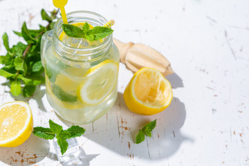 Summer lemonade on wood background