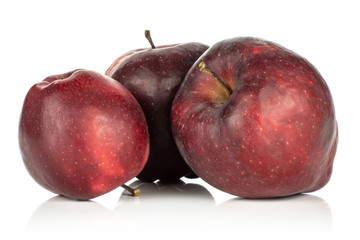 Fototapeta premium Three red delicious apples deep red isolated on white background.