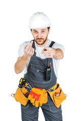 A builder or an employee in a protective helmet shows a hand gesture. Isolated over white background.