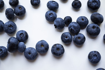 Blueberries on white background.