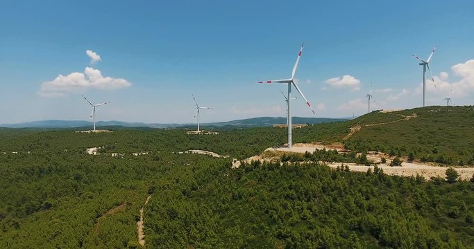 Windmill / Wind power technology - Aerial drone view on Wind Power, Turbine, Windmill, Energy Production - Green technology, a clean and renewable energy solution