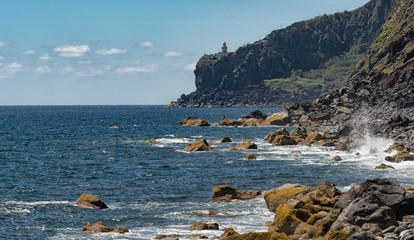 Fototapeta na wymiar Cliff with lighthouse, Nordeste, Sao Miguel