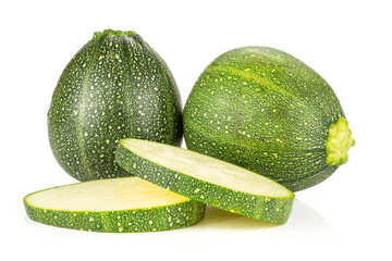 Group of two round zucchini and two slices isolated on white background fresh summer squash.