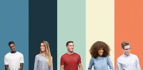 Group of people over vintage colors background looking away to side with smile on face, natural...