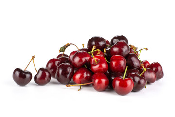 Sweet bright red cherry stack isolated on white...........................................................................